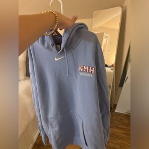 Blue NHM Athletics women’s sweatshirt